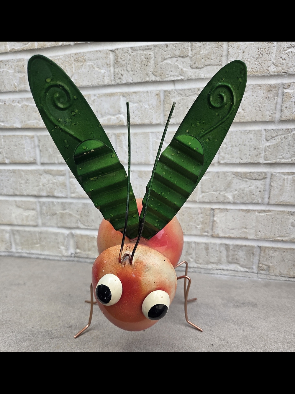 Whimsical Metal Bug Garden Decor in Green and Pink